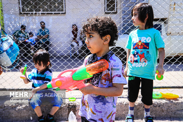 Children in Zanjan enjoy water play in Summer
