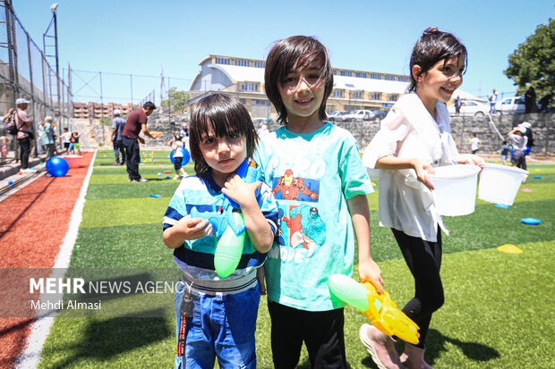 Children in Zanjan enjoy water play in Summer
