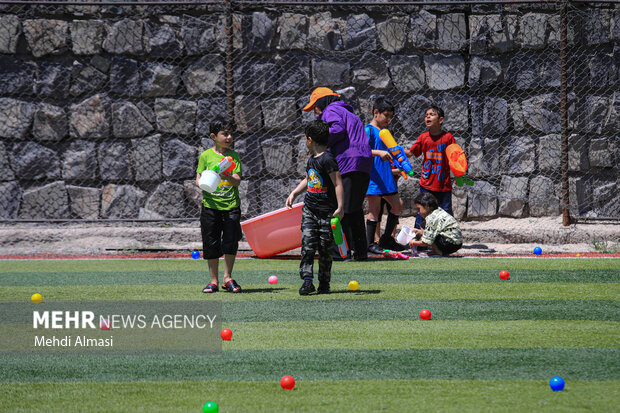 Children in Zanjan enjoy water play in Summer
