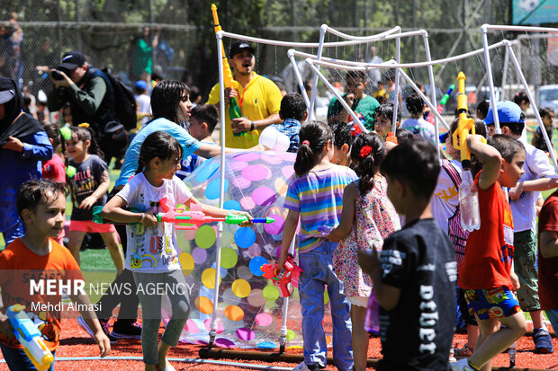 Children in Zanjan enjoy water play in Summer
