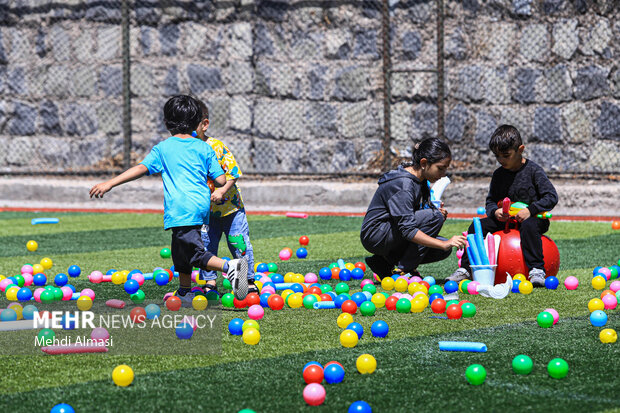 Children in Zanjan enjoy water play in Summer
