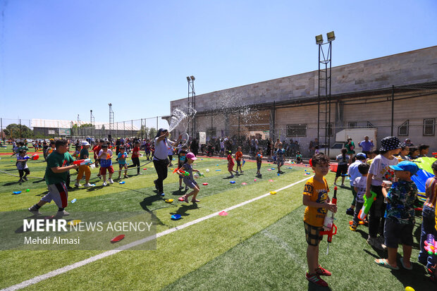 Children in Zanjan enjoy water play in Summer
