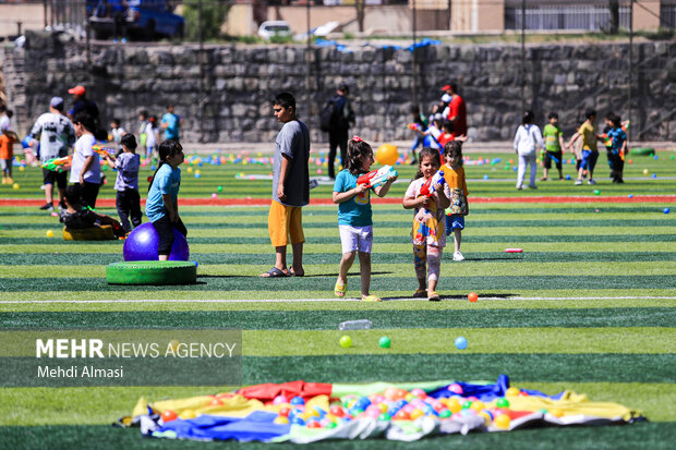 Children in Zanjan enjoy water play in Summer
