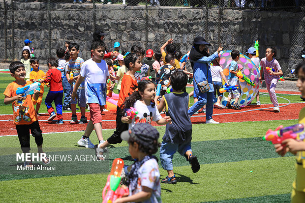 Children in Zanjan enjoy water play in Summer
