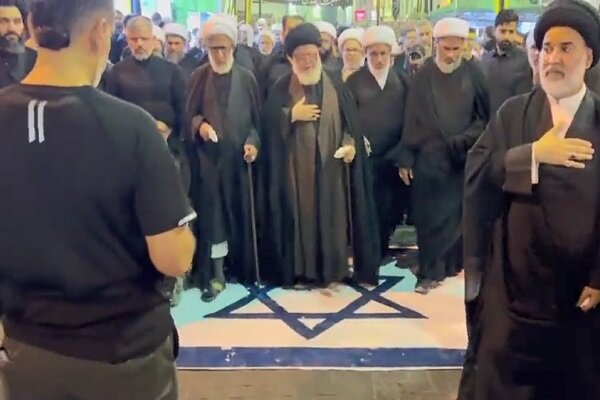 پرچم رژیم صهیونیستی زیر پای عزاداران حسینی در بحرین+ فیلم