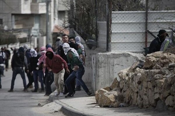 Resistance forces, Zionist troops clash in Occupied WB