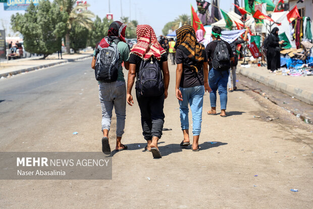 Arbaeen pilgrims walking toward Imam Hussein (AS) shrine
