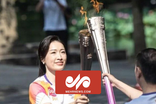 تصاویری از مراسم حمل مشعل بازی‌های آسیایی هانگژو چین