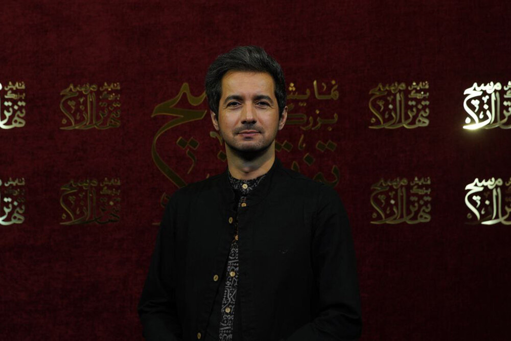 لحظه‌ تشرف نجم الدین شریعتی به لباس خادمی حرم امام رضا (ع)