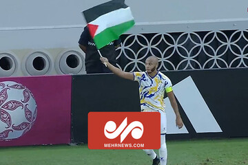 الغرافہ کے کپتان کا گول کے بعد "فلسطینی پرچم" کے ساتھ جشن