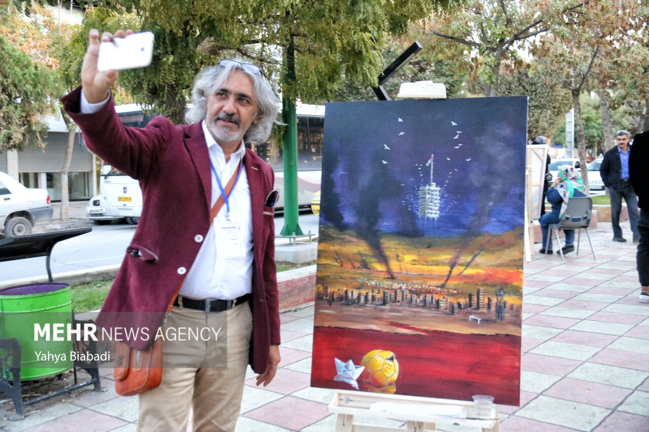 نمایشگاه خیابانی نقاشی غزه و فلسطین در راهپیمایی روز قدس کرمانشاه
