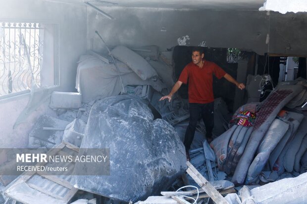 Many Gazans defy Zionist regime threats to evacuate homes