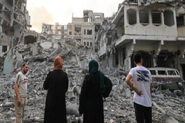 Gazans start to return to their homes despite Israeli threats