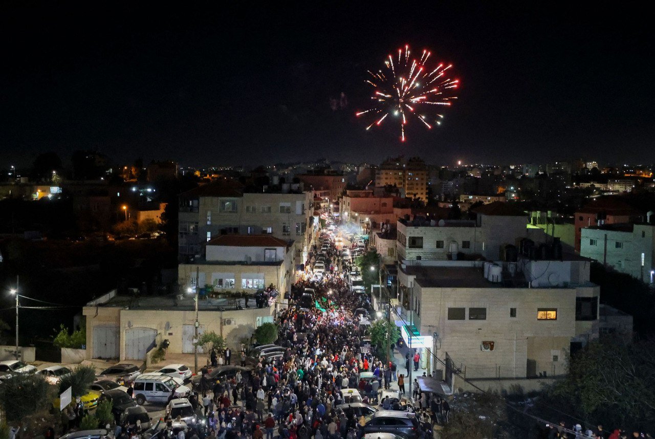 Palestinians Jubilant as Israelis Look on with Concern