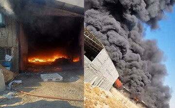 تلاش آتش نشانان برای اطفای حریق انبار یک کارخانه در ماهدشت