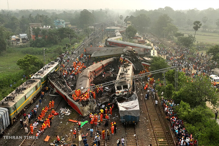 Rescuers work at the site of passenger train accident, in Balasore district, in the eastern Indian state of Odisha, on June 3. Rescuers waded through piles of debris and wreckage to pull out bodies and free people after two passenger trains derailed, killing more than 280 people. Hundreds of others were trapped inside more than a dozen mangled rail cars, in one of the country's deadliest train crashes in decades. [Arabinda Mahapatra/AP Photo]