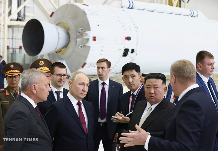 Russian President Vladimir Putin and North Korea's Kim Jong Un examine a rocket assembly hangar as they meet at the Vostochny Cosmodrome in the far eastern Amur region, Russia, on September 13. [Artyom Geodakyan, Sputnik, Kremlin Pool via AP Photo]
