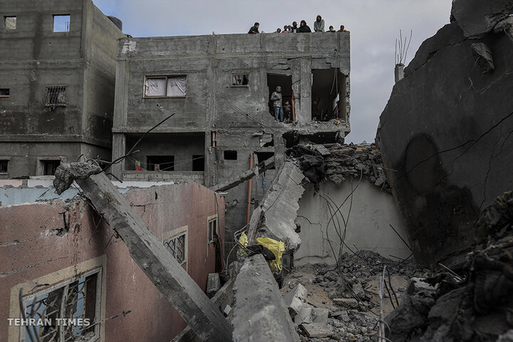Israel bombs homes in central Gaza, killing several families