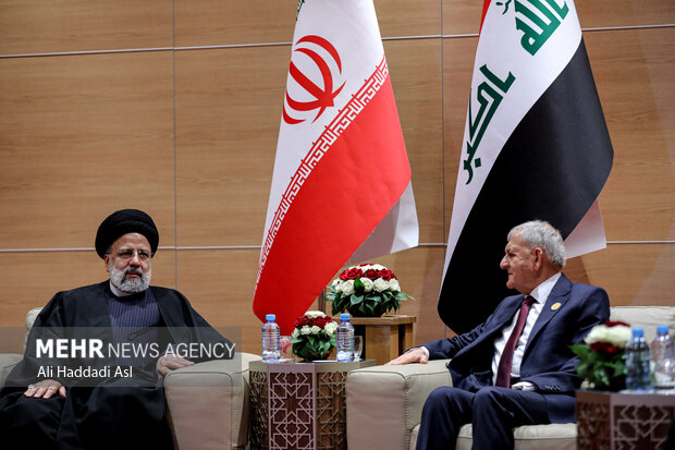 الرئيس الايراني يلتقي نظيره العراقي في الجزائر 