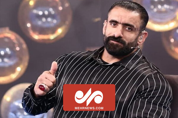 سەرەگرتنی خەڵکی ئەمریکا بۆ وێنەگرتن لەگەڵ وەرزشوانی کورد