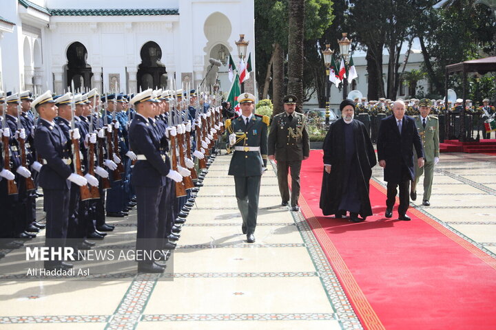 استقبال رسمی رئیس جمهور الجزایر از حجت الاسلام رییسی