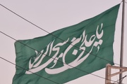پرچم سبز رضوی در ساحل خلیج فارس به اهتزاز در آمد