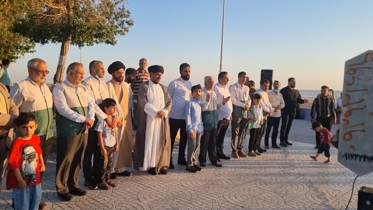 پرچم سبز رضوی در ساحل خلیج فارس به اهتزاز در آمد