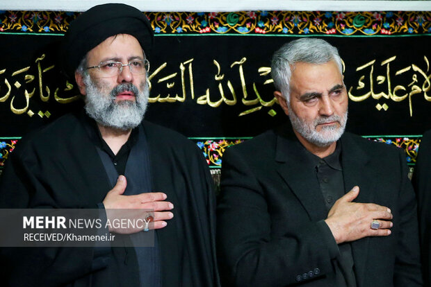 شهید حجت‌الاسلام رئیسی در کنار رهبر معظم انقلاب اسلامی
