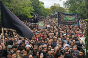 Huge crowd attend in President, FM funeral in Tabriz
