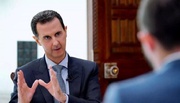 Syria's Assad tells Mokhber he will travel Tehran