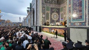 Late Iranian president buried at Imam Reza holy shrine