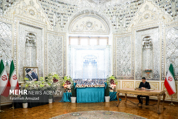 Ceremony of signing book of condolence for martyr Raeisi, FM