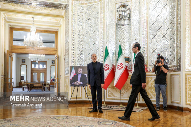 Ceremony of signing book of condolence for martyr Raeisi, FM