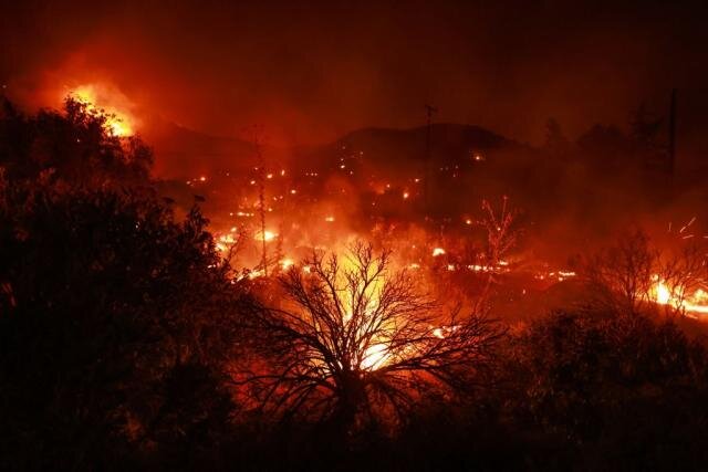 Wildfire erupts burning more than 11,000 acres near LA