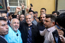 Pezshkian, Zarif in polling station