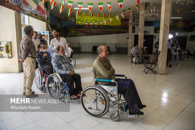 Disabled veterans cast votes at Shahid Mottahari