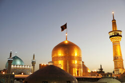 Mourning flag hoisted on Imam Reza shrine dome