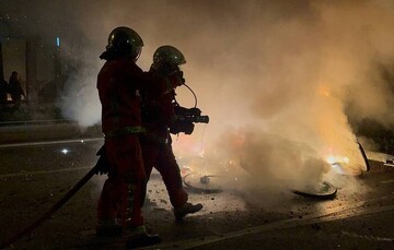 French police use tear gas during left rally in Paris