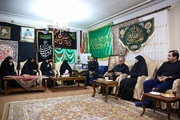 بالصور...الرئيس الايراني المنتخب يلتقي بعائلة الشهيد سليماني