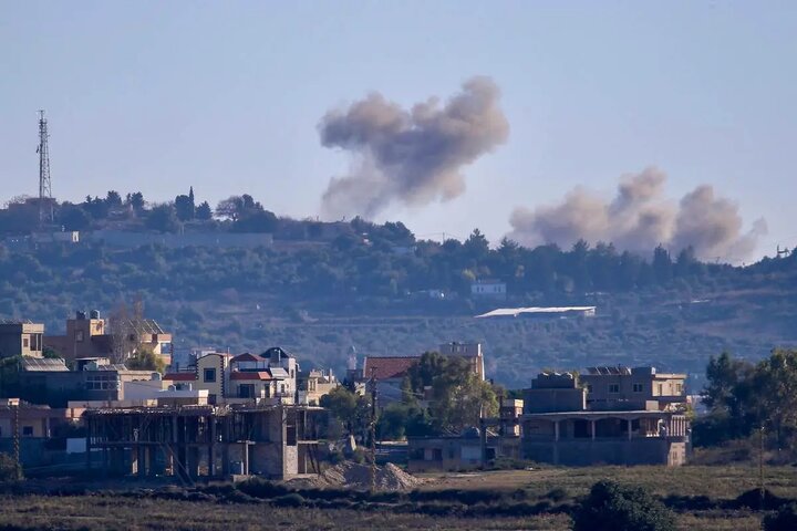 Hezbollah launches dozens of rockets at Israeli settlement