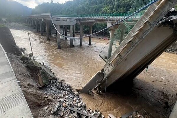 Floods, mudslides kill 2 in SW China, destroy homes, bridge