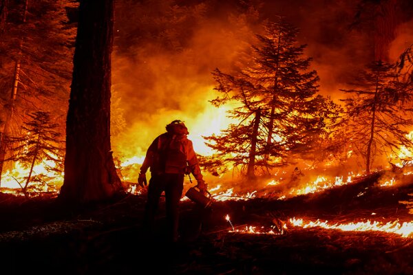 Wildfire torches hillside homes in southern California