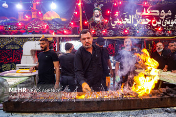 People in Karbala welcoming Arbaeen pilgrims