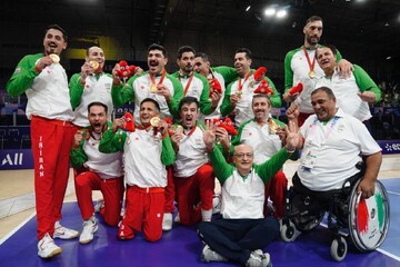 Hadi Rezaei walking on air after winning gold with sitting volleyball