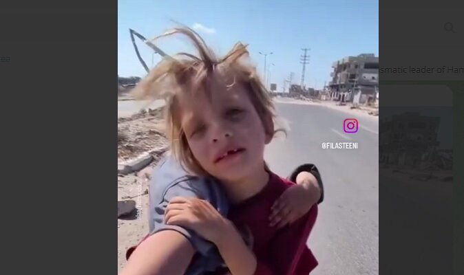 VIDEO: little Palestinian girl carries her injured sister