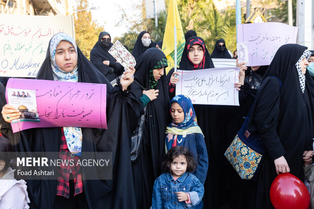 Iranian women gather in front of UK embassy