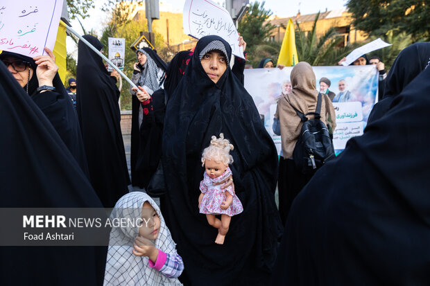 Iranian women gather in front of UK embassy