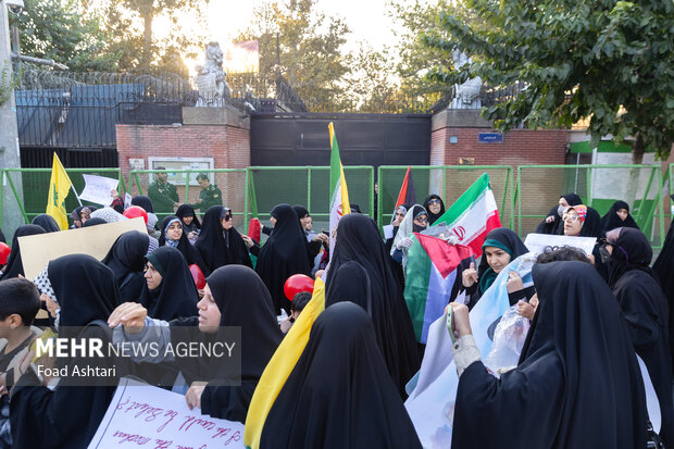 Iranian women gather in front of UK embassy