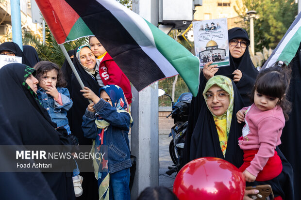 Iranian women gather in front of UK embassy