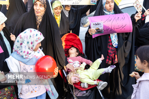 Iranian women gather in front of UK embassy